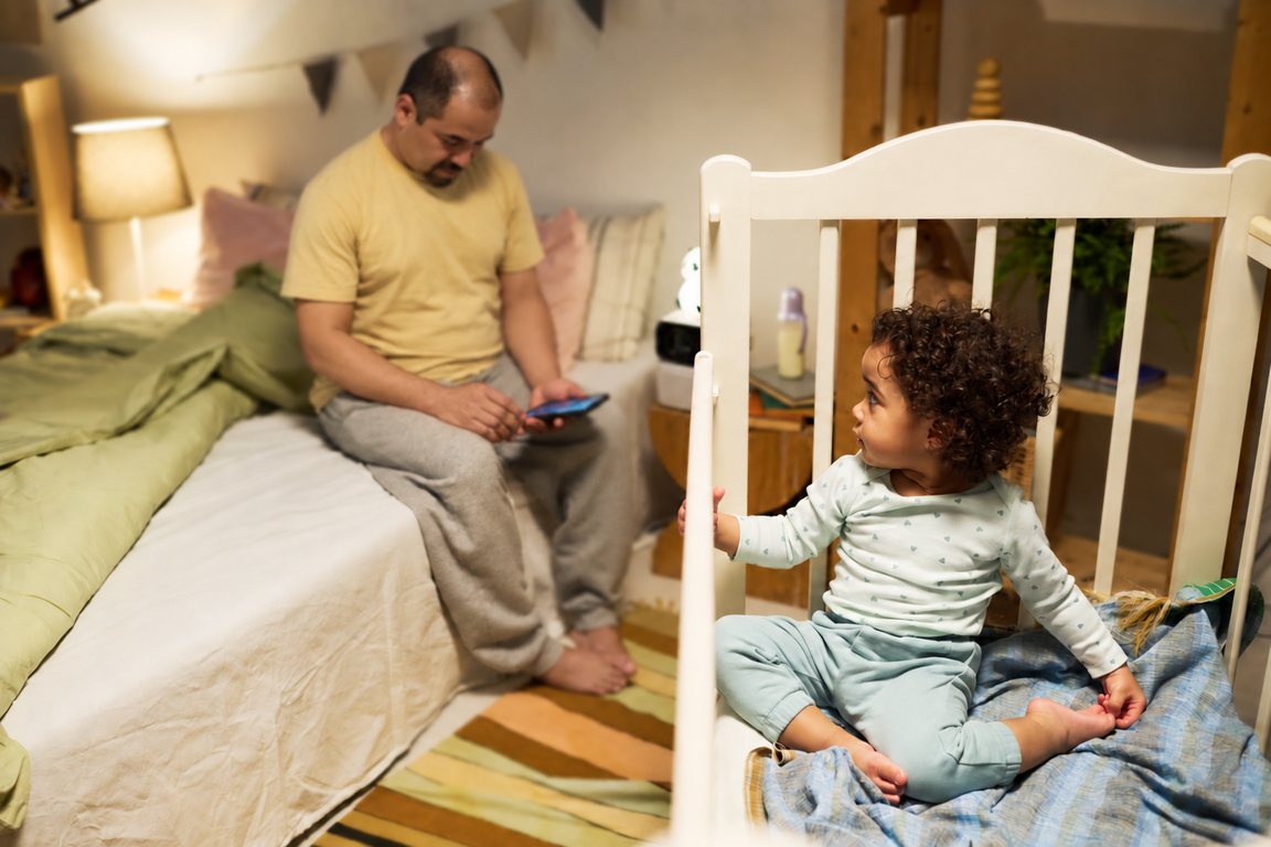 Caregiver recording toddler sleep after a difficult night