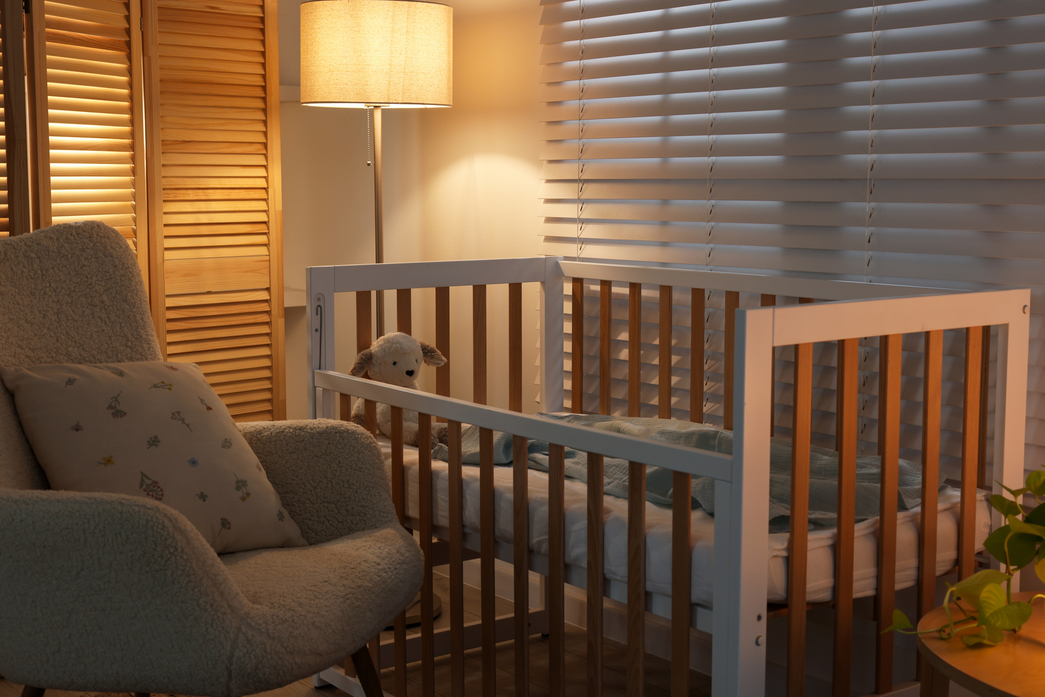 Calm nursery with a crib and soft nightlight ready for bedtime